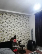 اتاق خواب با بخاری و کاغذ دیواری آپارتمان در گرگان 14564987644
